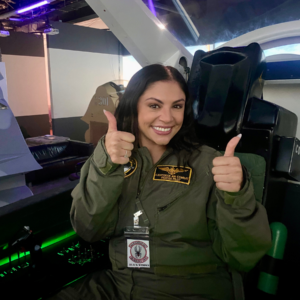 Woman flying fighter jet simulation in Anaheim