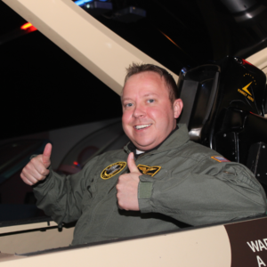 Guest flying fighter jet simulator